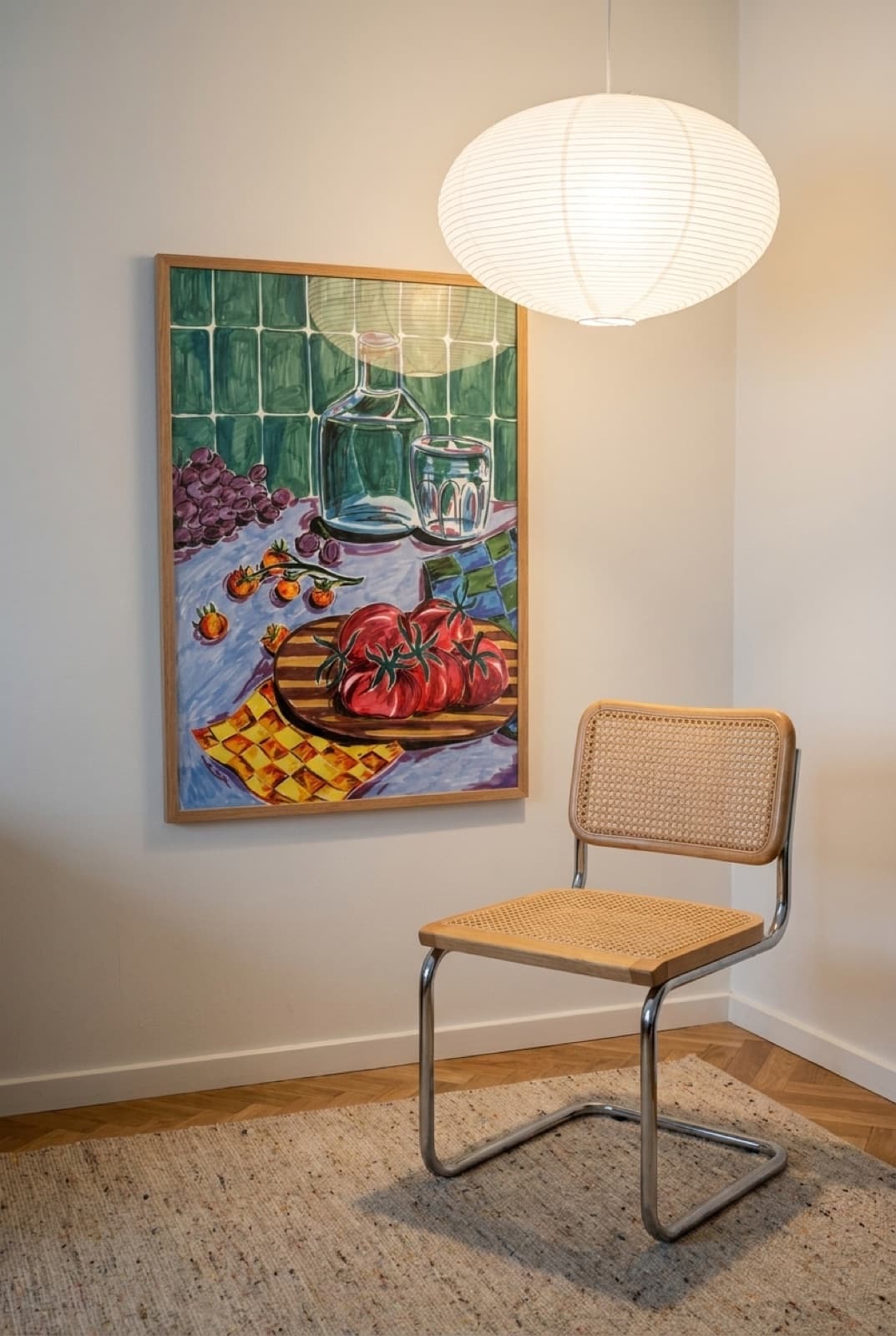 Hyttefrokost botanical print above a cane chair